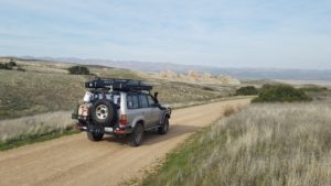 Toyota Landcruiser driving down a dirt road in Carrizo Plain National Monument