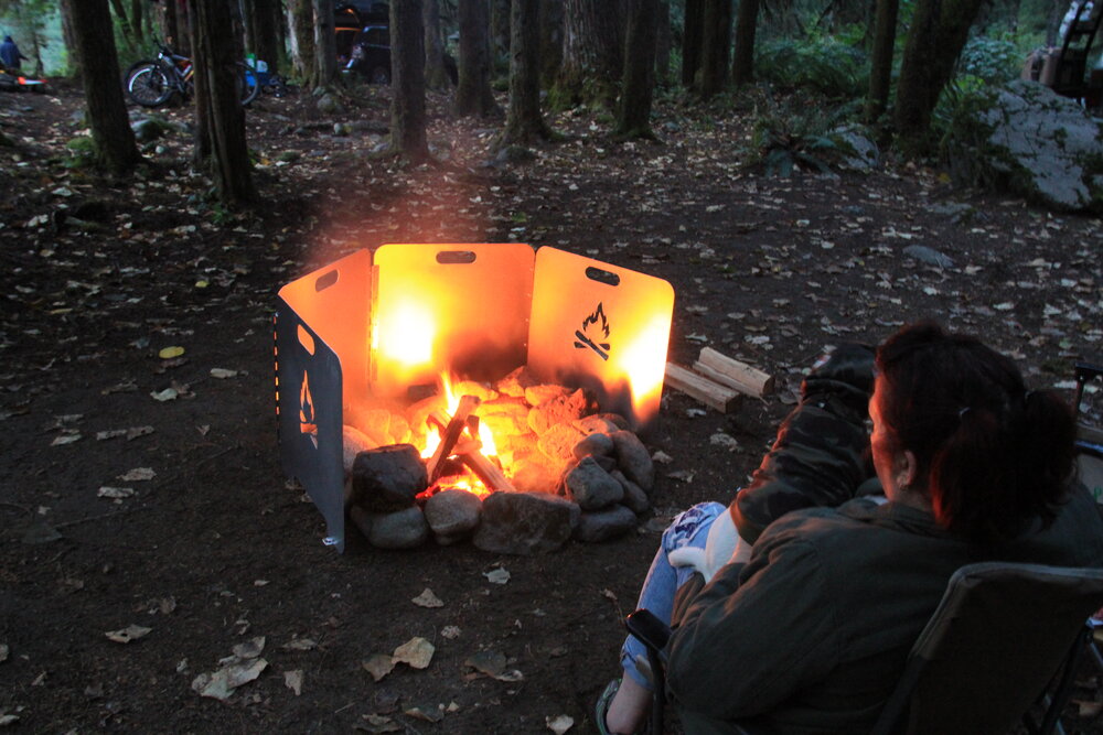 The glow of a campfire enhanced by The Original Fire Reflector. Photo: Anthony Sicola