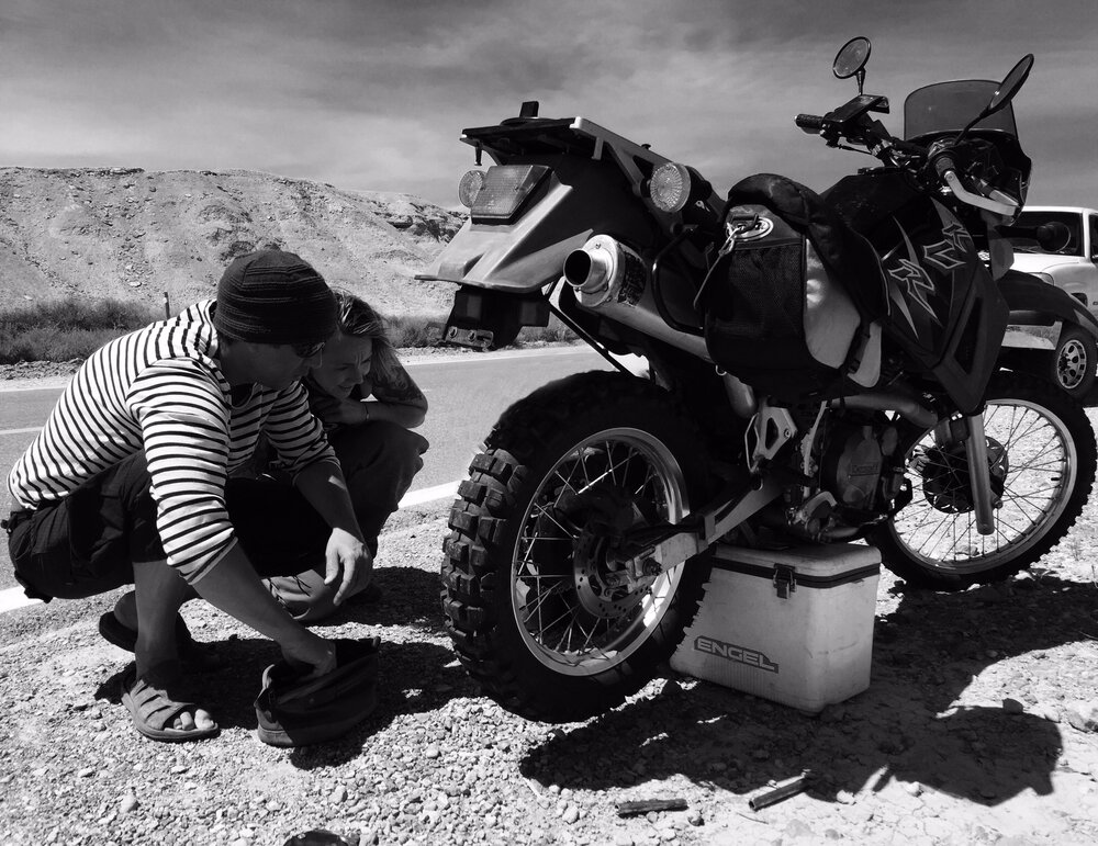 Bike maintenance on a cooler