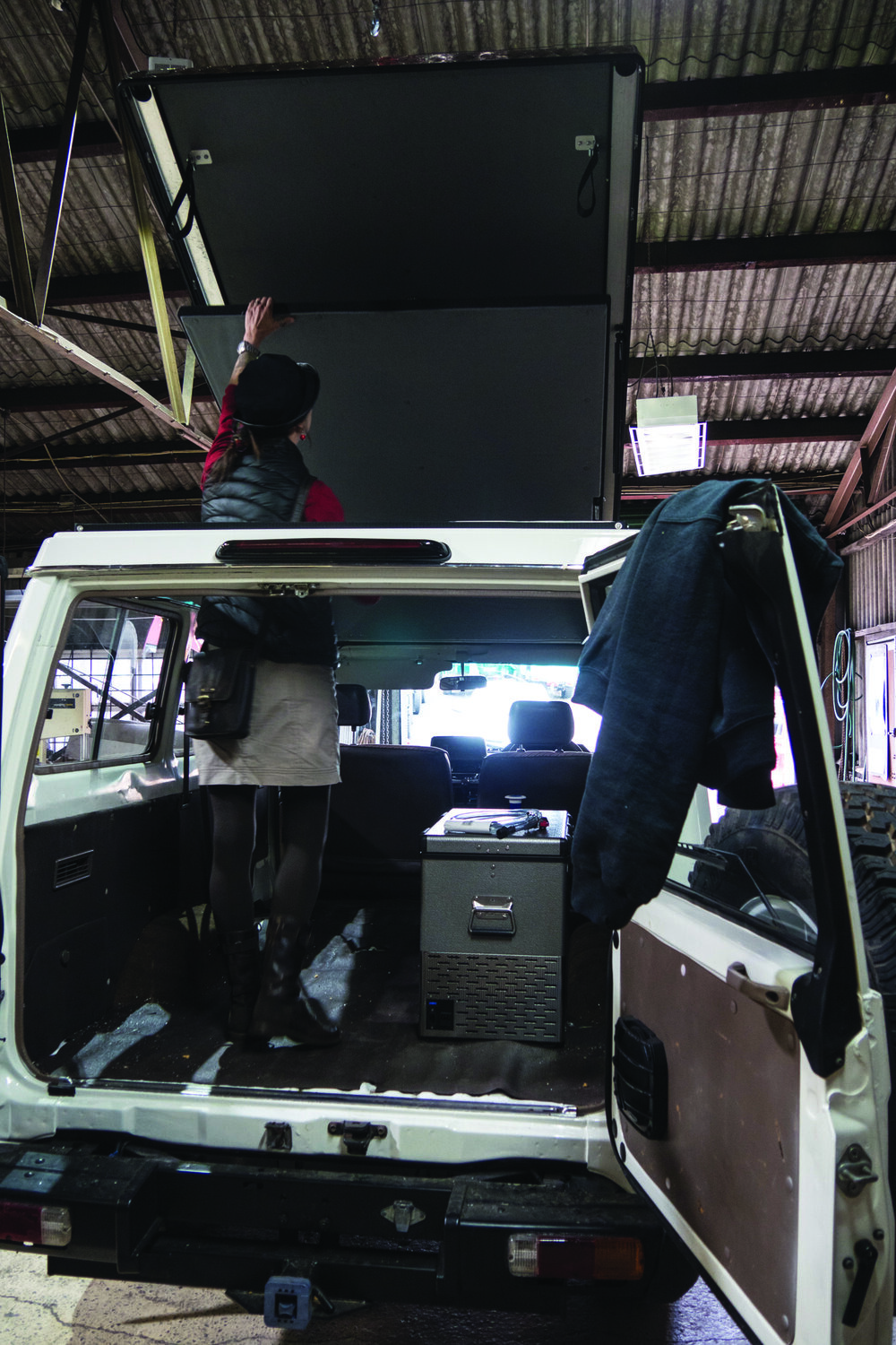  Roseann inspecting the pop-top before the canopy is attached. | Jonathan Hanson 