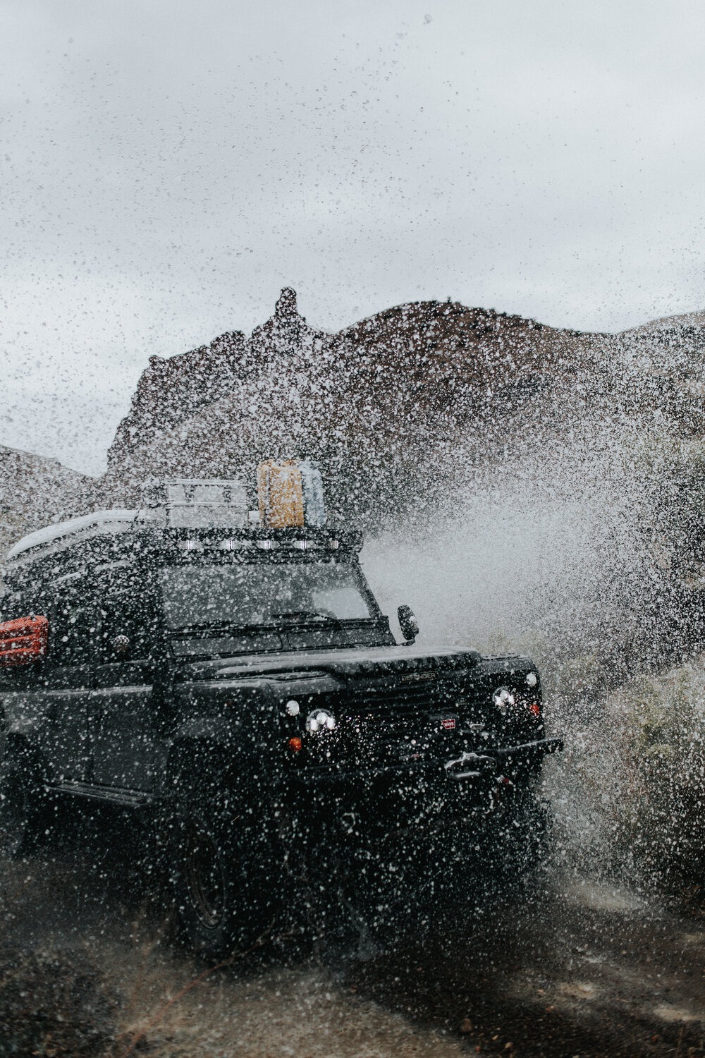 Ian making a picture perfect splash in the Owyhee Canyonlands. | Nomadica Outfitters