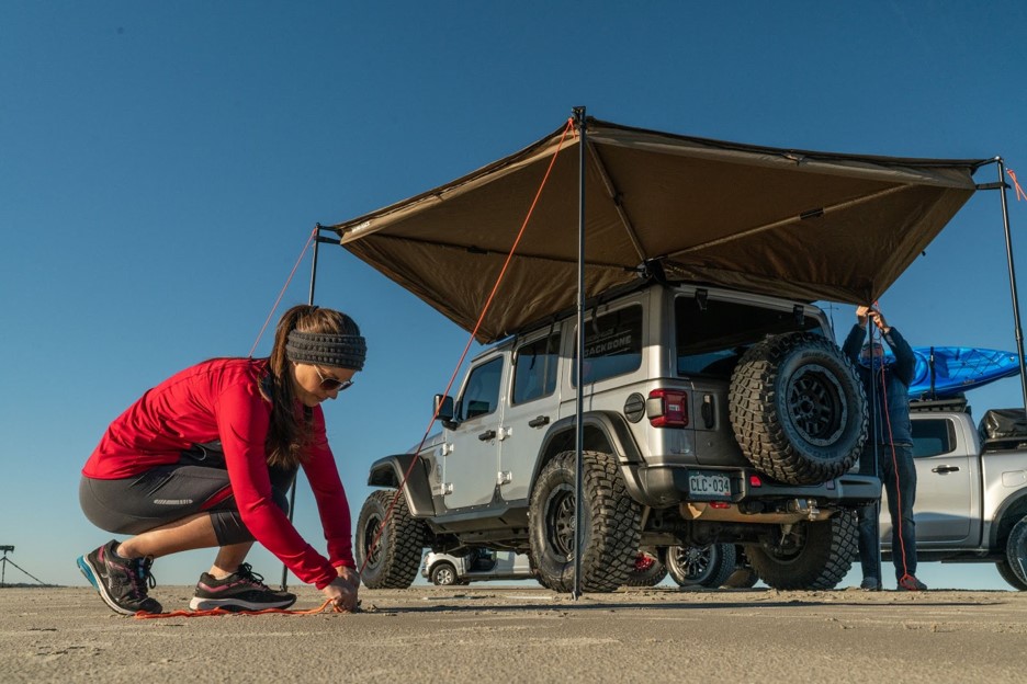 Batwing awning open on a Jeep. 