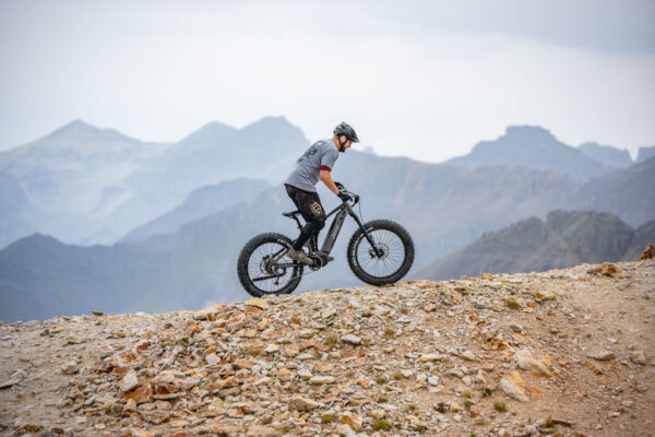 QuietKat bike rider ascending a ridgeline.