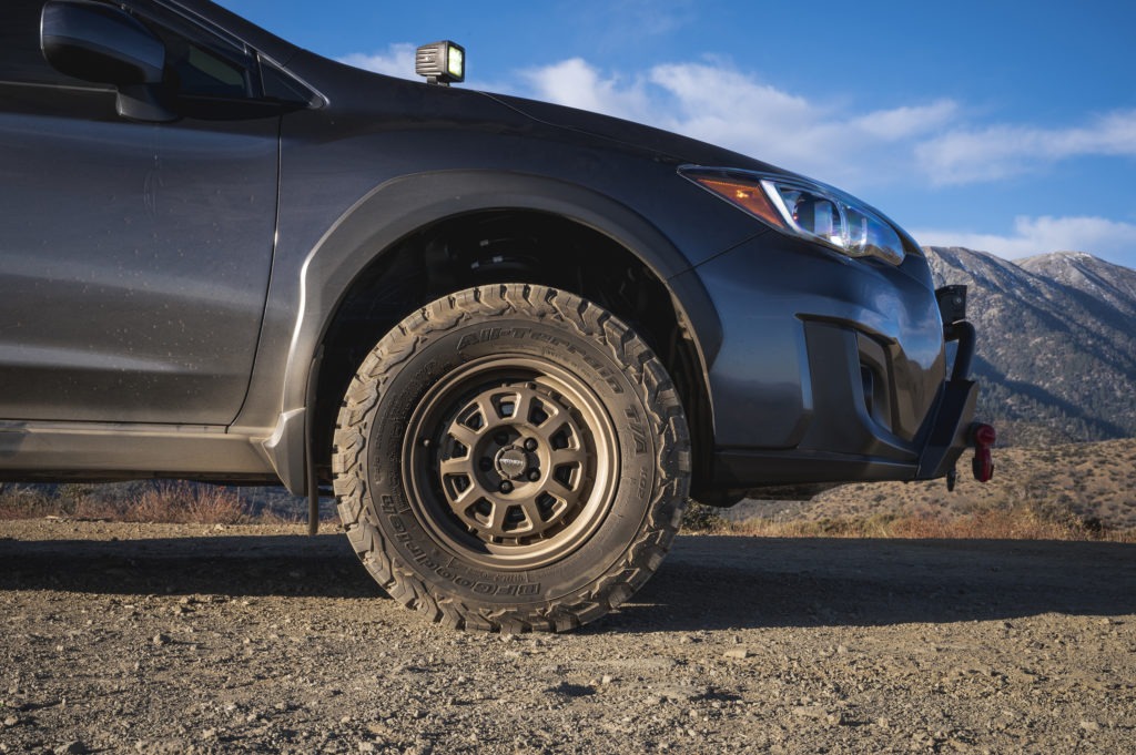 Close up of Mayhem Voyager wheel on a Crosstrek.