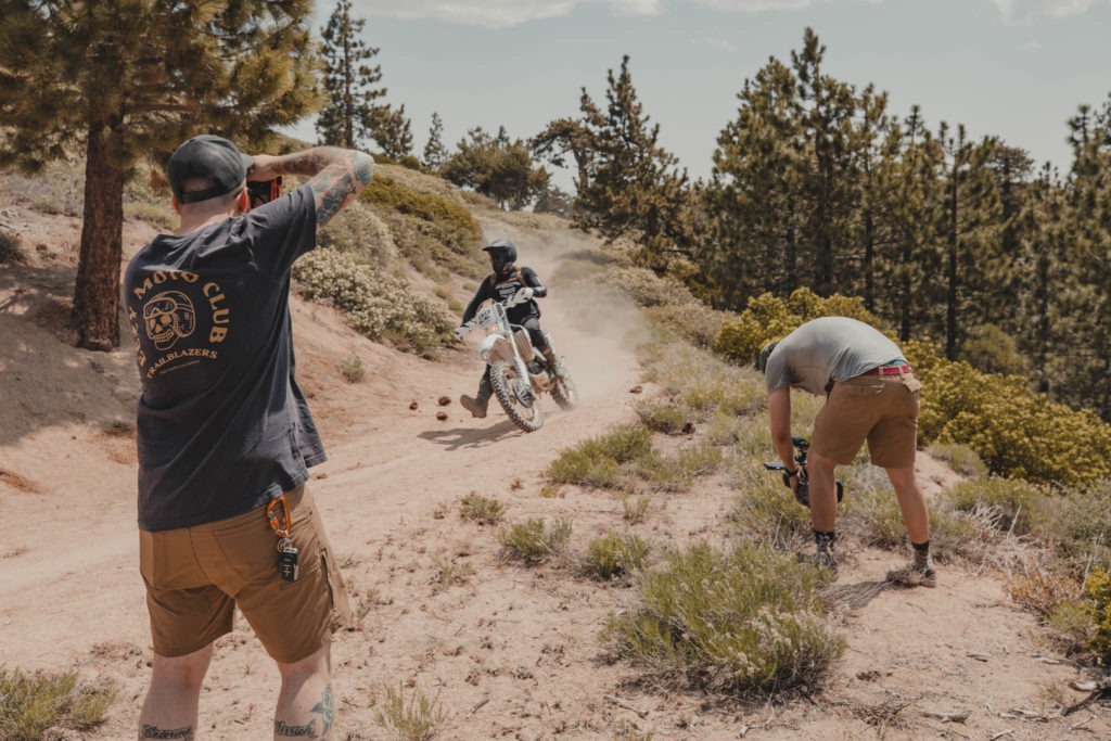 Camera crew films dirt biker riding