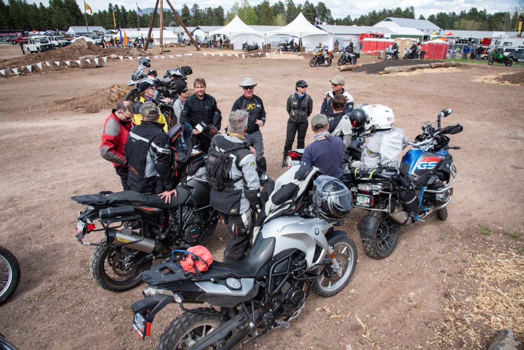 Hands on motorcycle training at Overland Expo students learn from their coaches