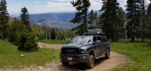 RAM pickup climbing section of forest road.