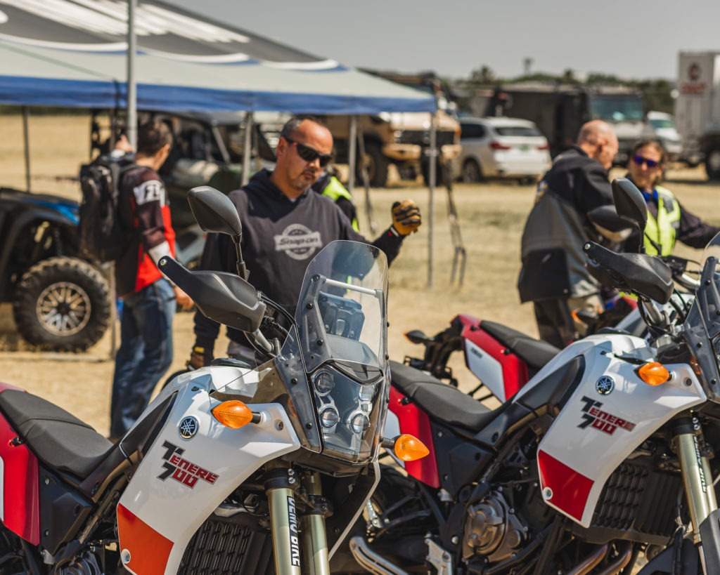 Riders looking at the Yamaha T700 motorcycle booth