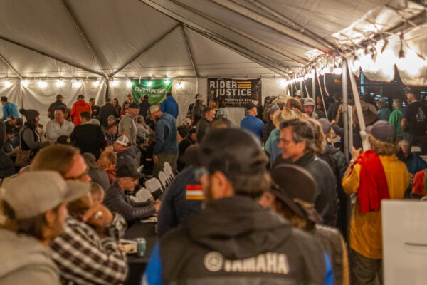 Attendees at The Rider Justice Moto Party at Overland Expo