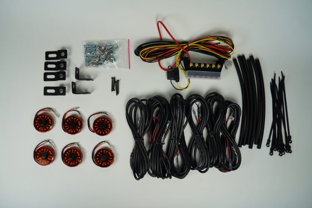 A set of lights and wiring on a white table