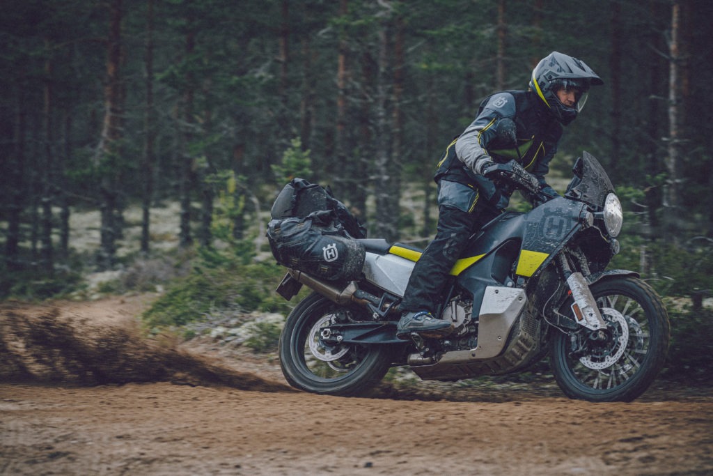 Husqvarna Norden 901 motorcycle riding on a dirt trail