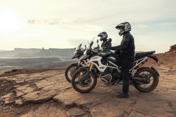 Two riders on Triumph Tiger 1200s adventure motorcycle