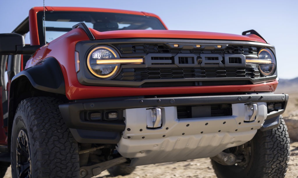 Front end of the 2022 Ford Bronco Raptor featuring bash and skid plates.