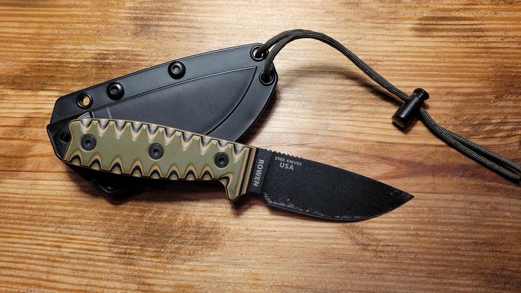 Photo of a ESEE 3 fixed blade knife on a desktop.