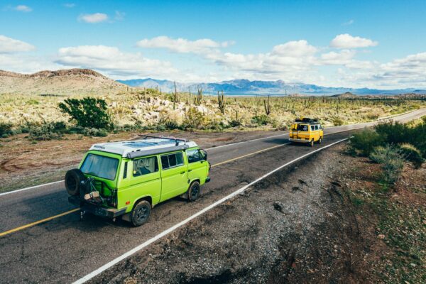 Vanagon VW Volkswagen driving down the paved highway in Baja van life overlanding