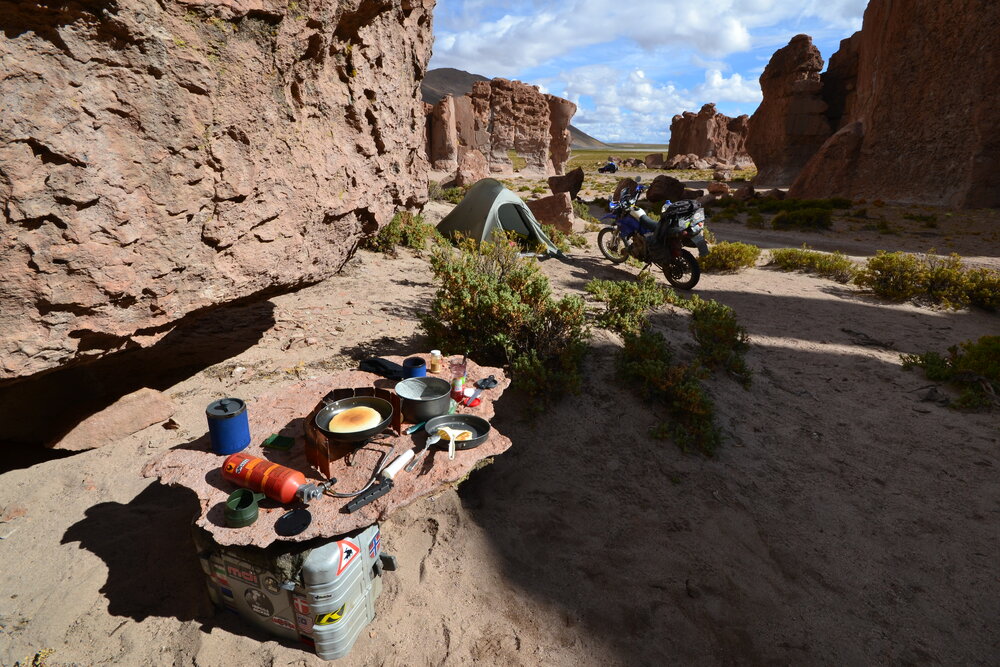 Azure O'Neil preparing a pancake breakfast on the Lagunas Route in Bolivia.