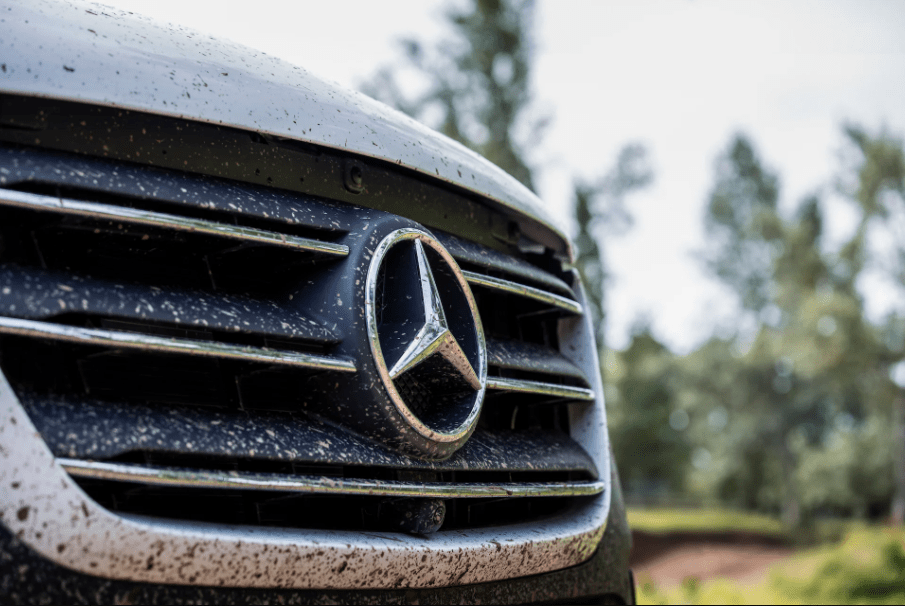 Mud on the front grille of a Mercedes-Benz Sprinter