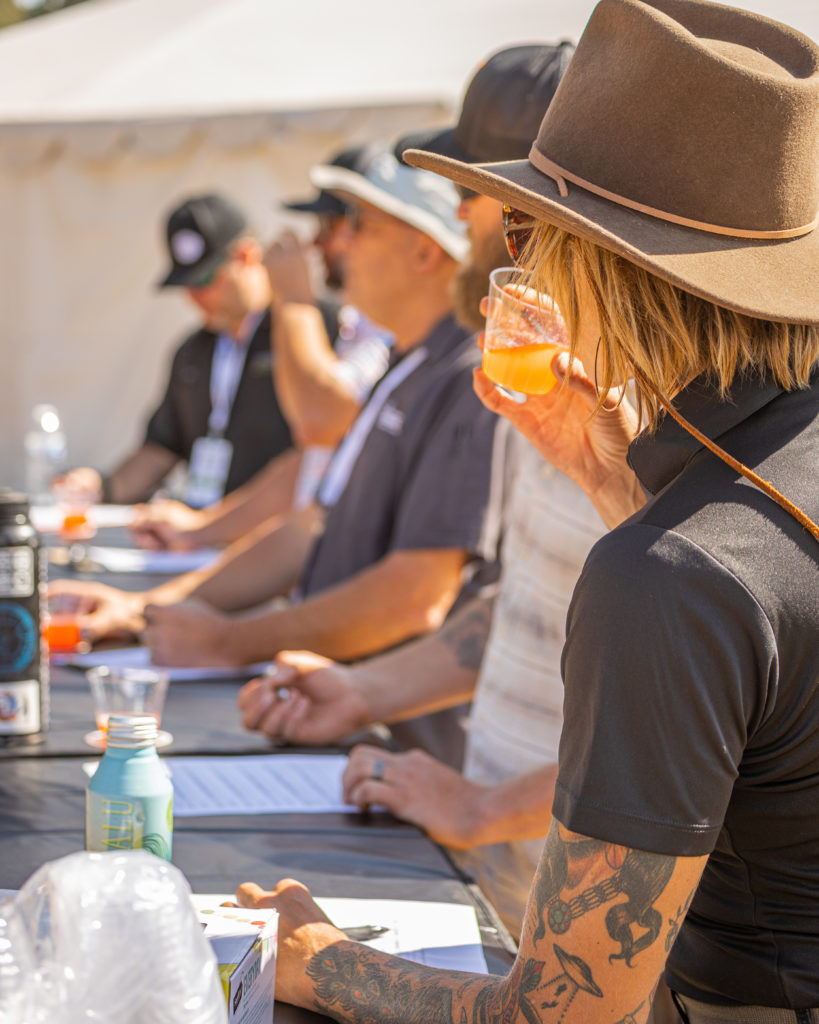 People having cocktails at Overland Expo