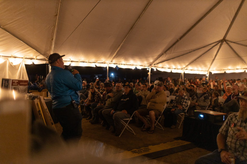 Guests enjoying the free raffle prizes at the Overland Expo Foundation Raffle at Overland Expo WEST