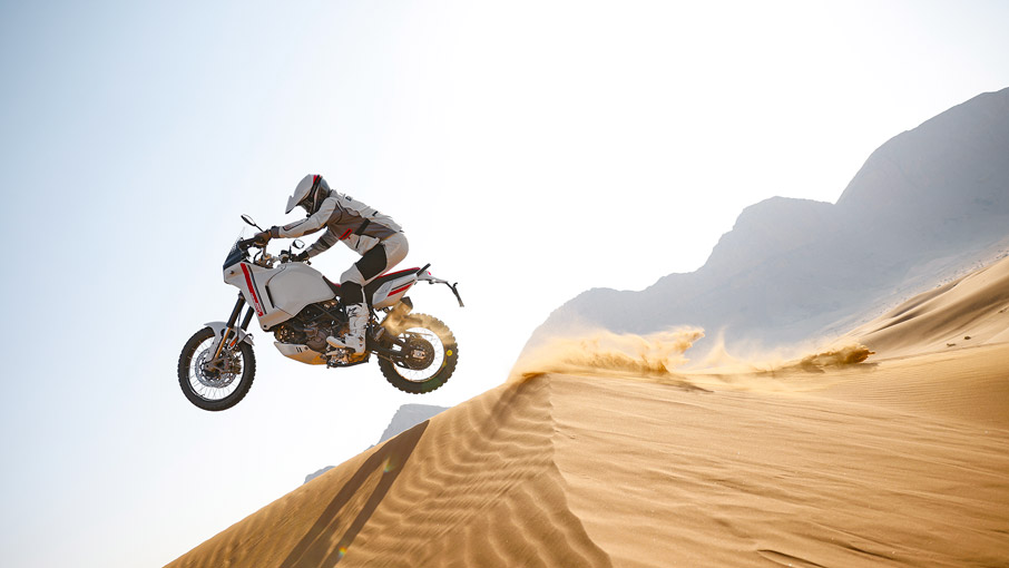 Ducati DesertX riding in the sand