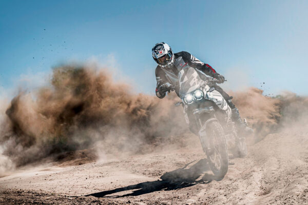 Ducati DesertX riding in the sand