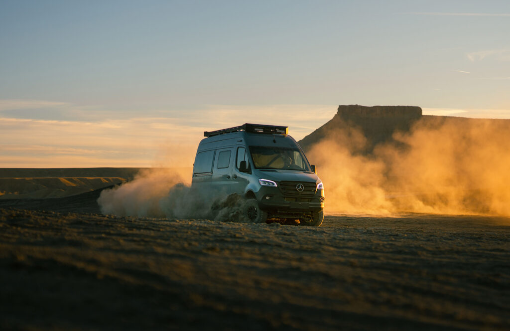 Winnebago Revel on a desert road.