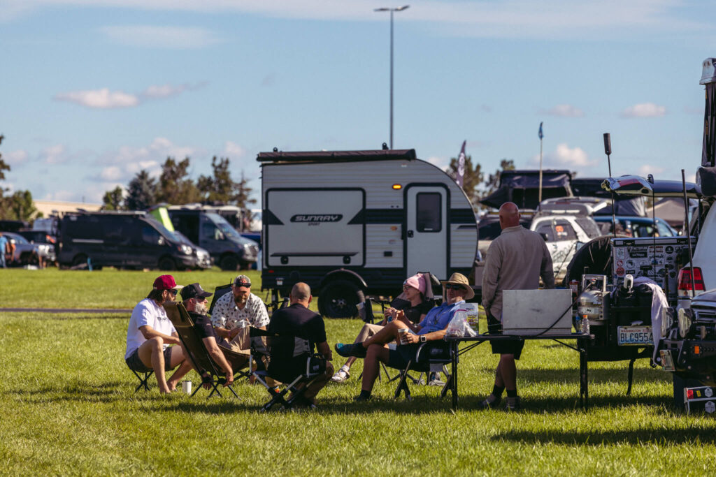 campers relaxing at Overland Expo PNW after a day of show specials