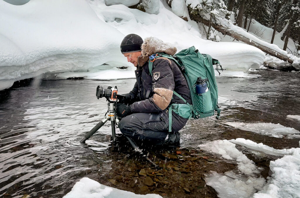 Matt Suess photographing in the snow